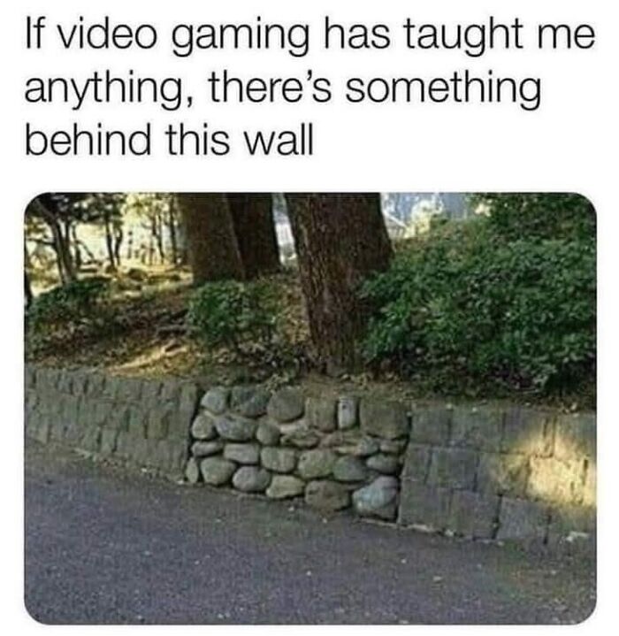 Random meme about video gaming hinting at something behind a stone wall