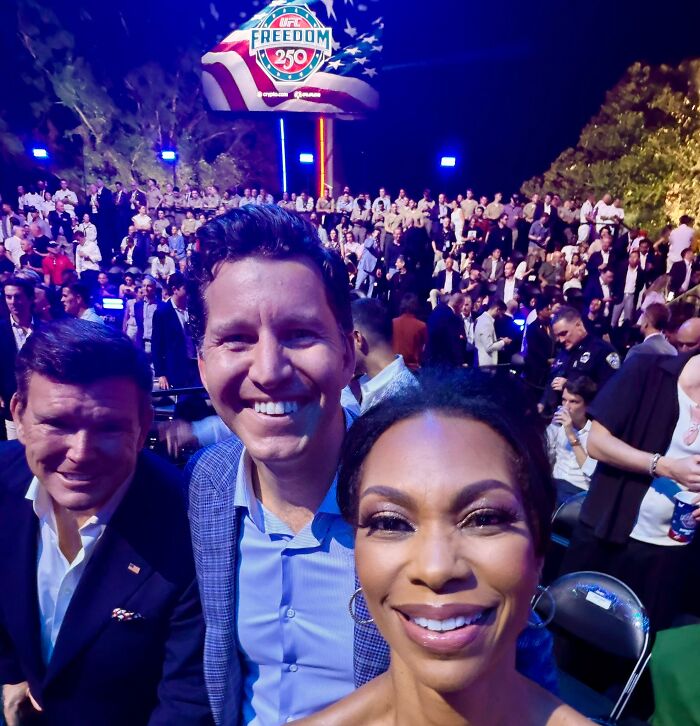 Group selfie with crowd at UFC 250 fight on the White House lawn