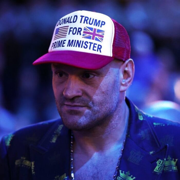 Man wearing a hat at UFC 250 fight on White House lawn with Donald Trump slogan
