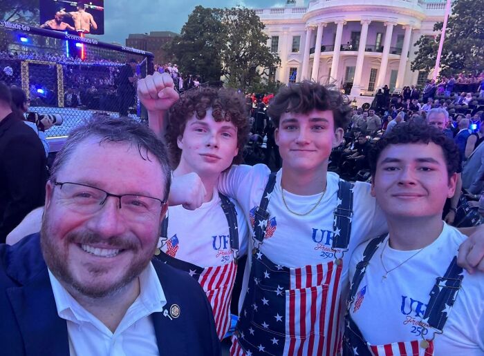 Group selfie of people at UFC 250 fight outside the White House