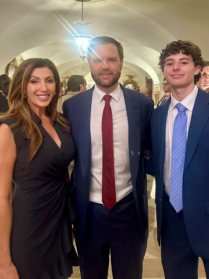 Three attendees posing at UFC 250 fight event inside the White House