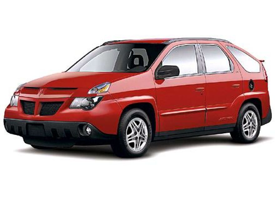 A red Pontiac Aztek, an ugly car that somehow became legendary, shown against a plain white background.