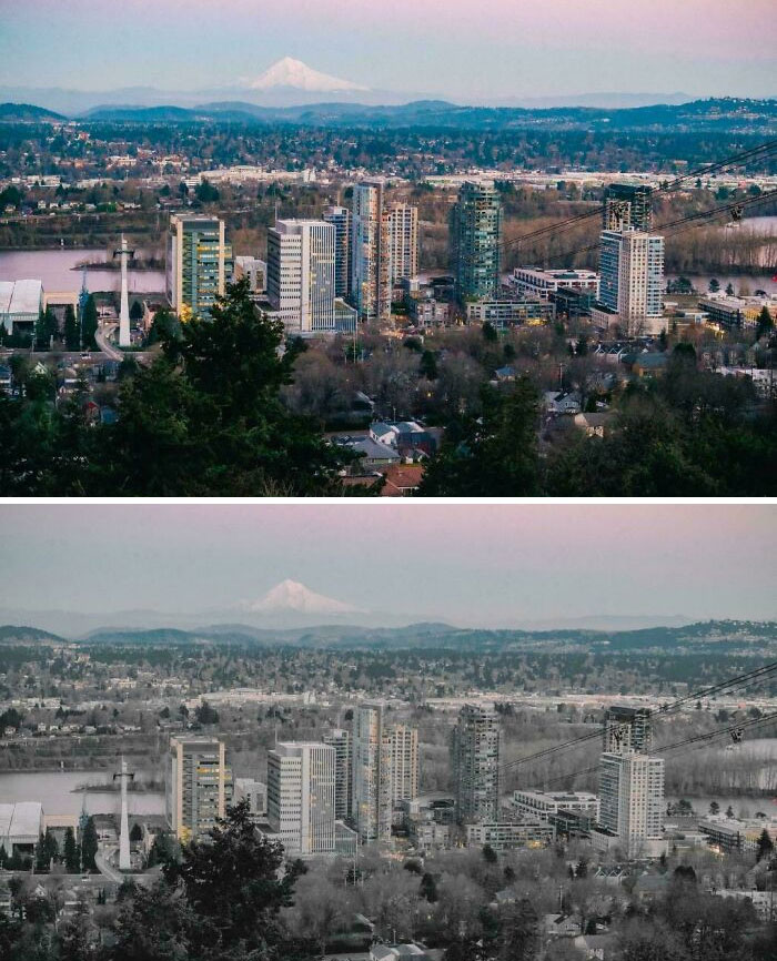 Urban hell cityscape with high-rise buildings and distant mountains at dusk