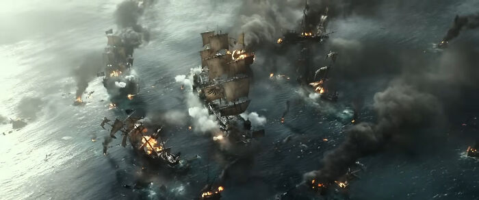 Ships ablaze on the open sea, a scene from the movie Pirates of the Caribbean. Ships ablaze on the open sea, a scene from the movie Pirates of the Caribbean.