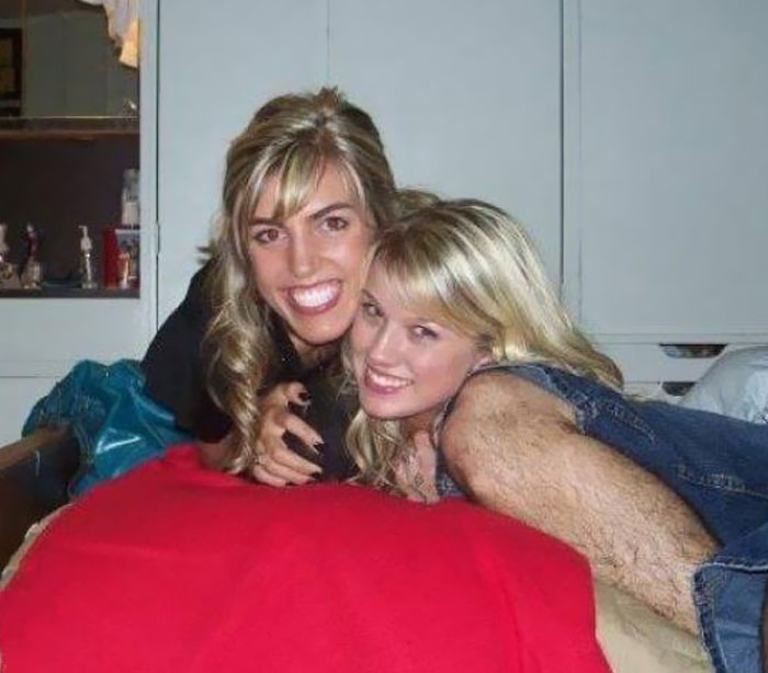 Optical illusion photo of two women, one with an arm that looks like a furry leg. A 'When You See It' picture.