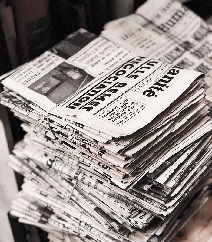 Stack of old newspapers symbolizing decades of mysterious marriage fixes Stack of old newspapers symbolizing decades of mysterious marriage fixes