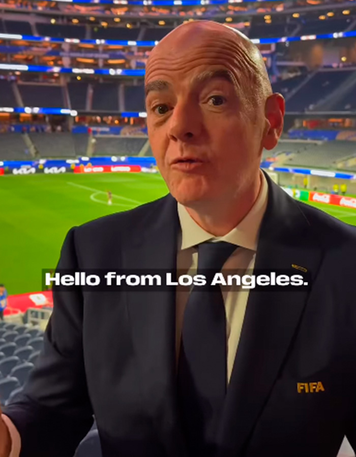 World Cup boss Gianni Infantino recording a video message in a soccer stadium. World Cup boss Gianni Infantino recording a video message in a soccer stadium.