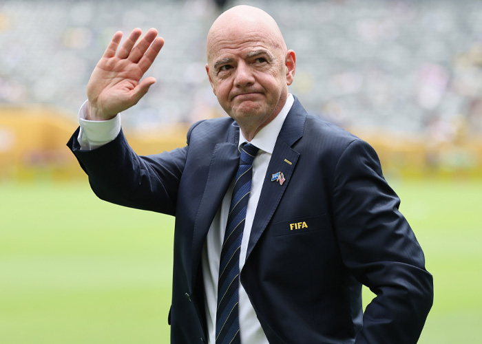 The World Cup boss, Gianni Infantino, waving to a crowd, amid a soccer world scandal. The World Cup boss, Gianni Infantino, waving to a crowd, amid a soccer world scandal.