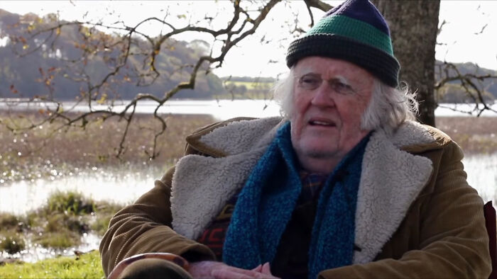 Older man outdoors recounting disappointing celebrity encounters