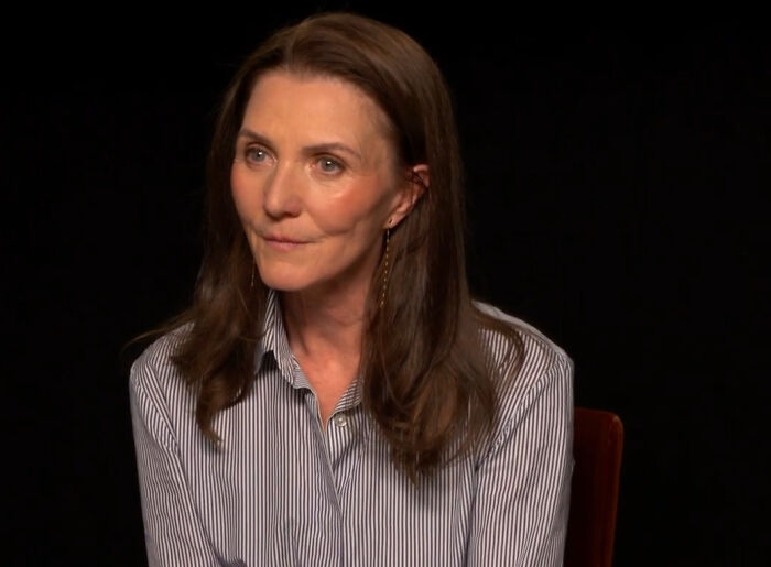 Woman sharing experience about disappointing celebrity encounters in interview