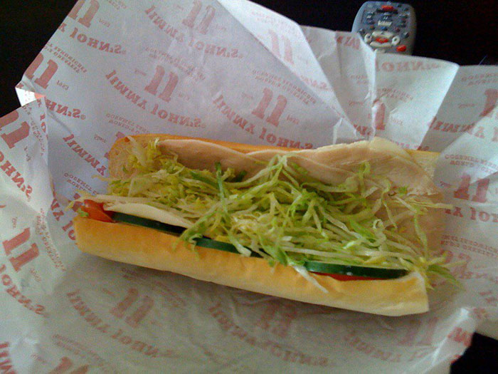 Sub sandwich with lettuce and cucumber illustrating fired employees