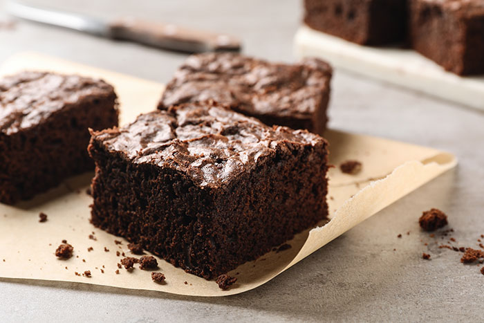 Close-up of chocolate brownies highlighting fired employees