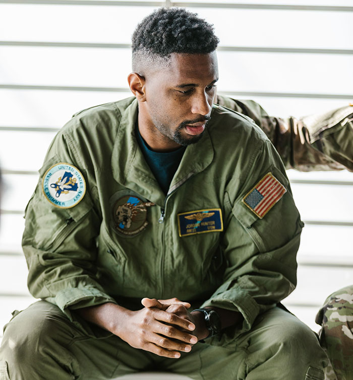 Soldier thoughtfully contemplating the truth about friendship