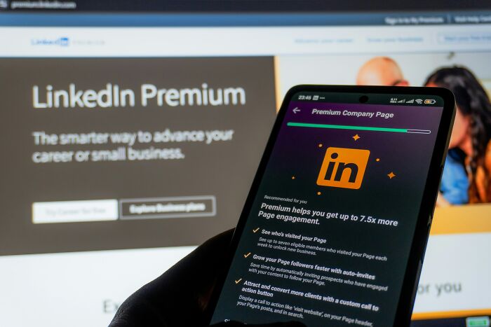 Smartphone displaying LinkedIn Premium features for career advancement