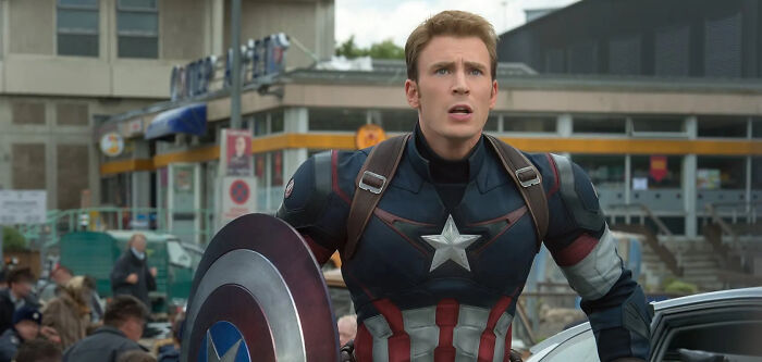 Chris Evans as Captain America, looking surprised while holding his shield, reflecting his internet glowdown. Chris Evans as Captain America, looking surprised while holding his shield, reflecting his internet glowdown.