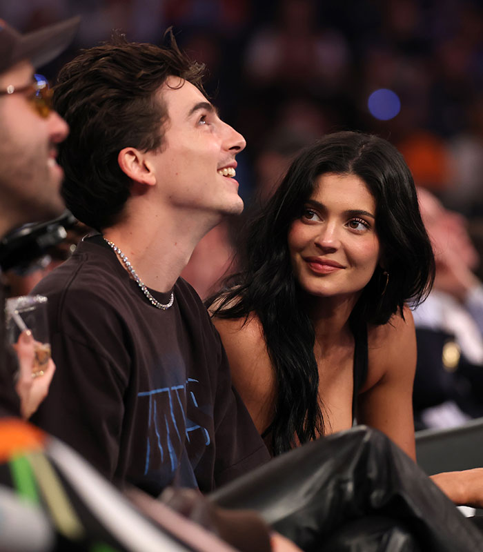 Kylie Jenner and Timothée Chalamet enjoying a World Cup appearance, sparking middle aged mother comparisons. Kylie Jenner and Timothée Chalamet enjoying a World Cup appearance, sparking middle aged mother comparisons.