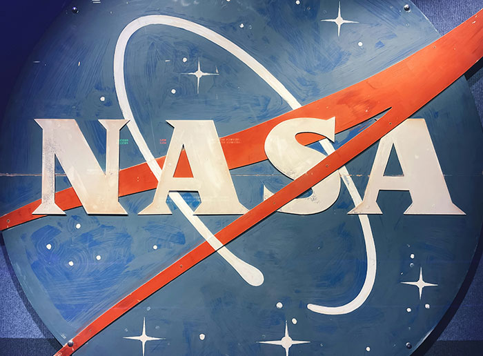 The NASA logo, a symbol of space exploration, featured prominently in claims about edited photos to hide alien presence.