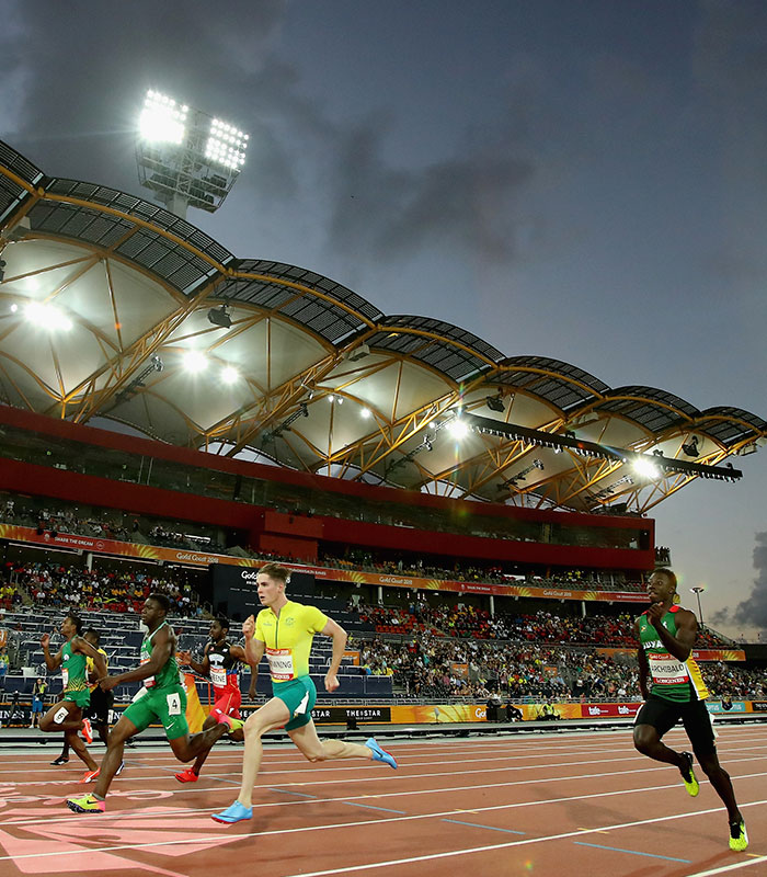Sprint star Rohan Browning competes on a track, emphasizing the controversial rule that may benefit rivals.