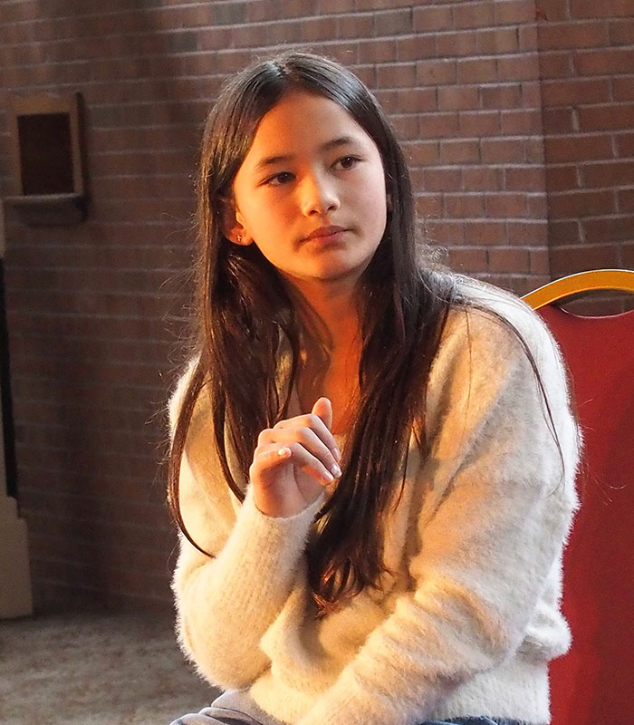 Kaylee Hottle, Godzilla actress, looking thoughtful in a casual setting, remembering her fatal crash. Kaylee Hottle, Godzilla actress, looking thoughtful in a casual setting, remembering her fatal crash.