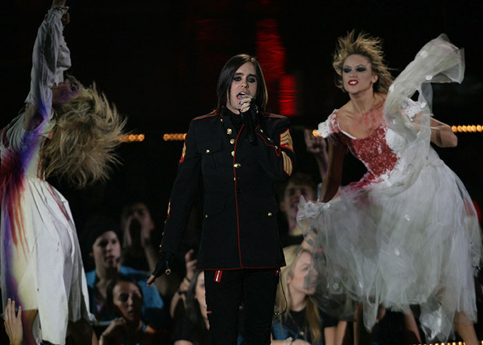 Jared Leto performing on stage, facing new allegations as Hollywood's most persistent predator. Jared Leto performing on stage, facing new allegations as Hollywood's most persistent predator.