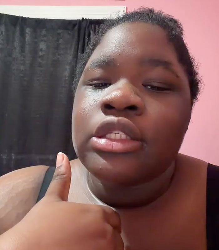 A young woman gives a thumbs up, causing outrage with her video about giving up her baby. A young woman gives a thumbs up, causing outrage with her video about giving up her baby.