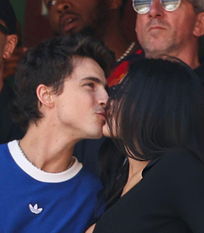 Kylie Jenner and Timothée Chalamet sharing a kiss at the World Cup, drawing middle aged mother comments. Kylie Jenner and Timothée Chalamet sharing a kiss at the World Cup, drawing middle aged mother comments.