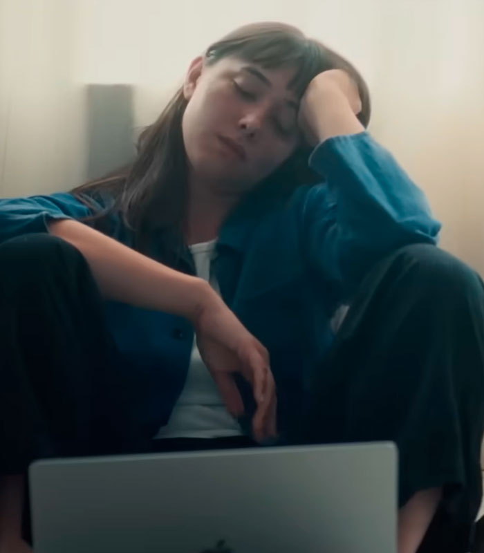 A woman looking tired, sitting by a laptop, after making a bombshell discovery about her dad and Charles Manson. A woman looking tired, sitting by a laptop, after making a bombshell discovery about her dad and Charles Manson.