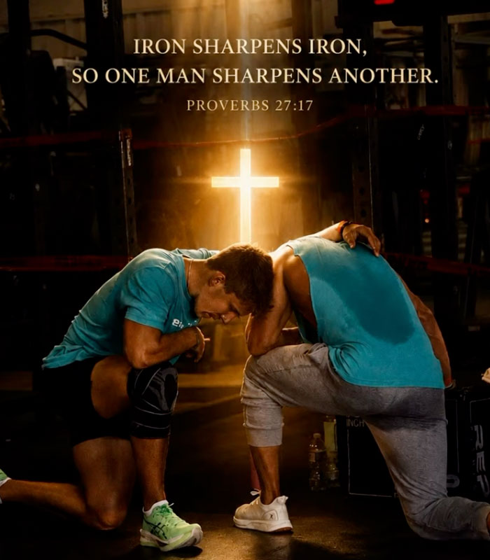 Two Christian men kneeling in a gym with a glowing cross, illustrating men-only gyms and Christian men.