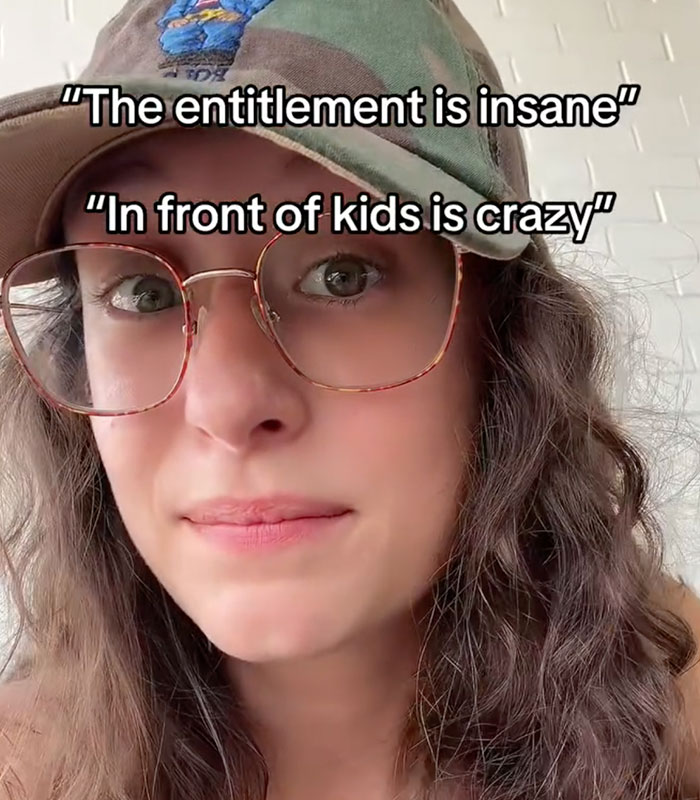 A woman with curly hair and glasses, showcasing the entitlement of a Karen forcing a man out of a public space. A woman with curly hair and glasses, showcasing the entitlement of a Karen forcing a man out of a public space.
