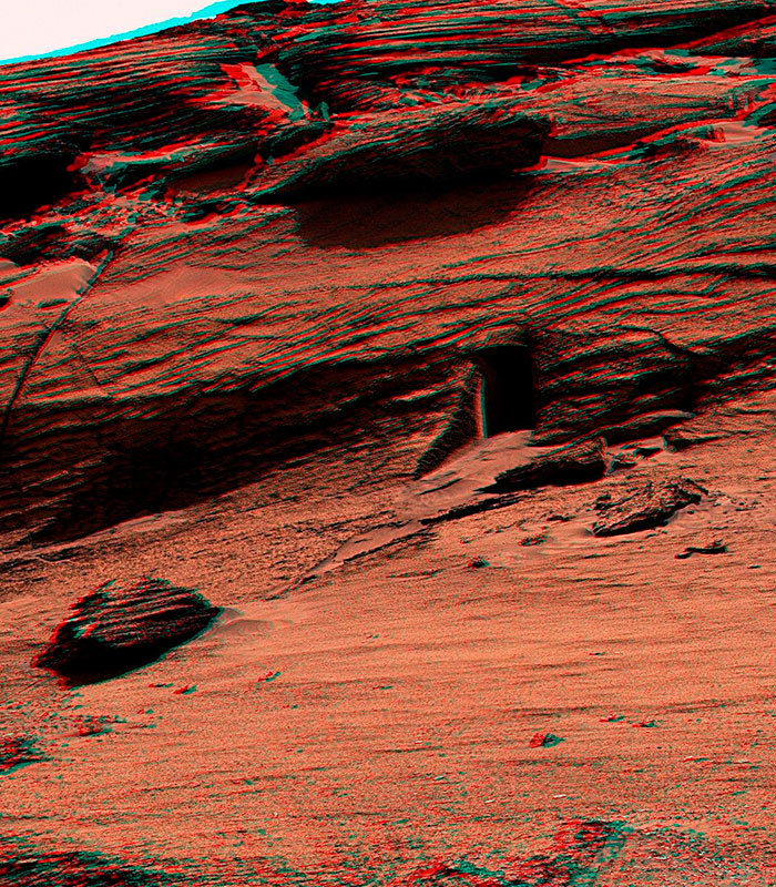 NASA Mars photo with a mystery object, a cave-like opening on the red planet, igniting a dramatic war theory. NASA Mars photo with a mystery object, a cave-like opening on the red planet, igniting a dramatic war theory.