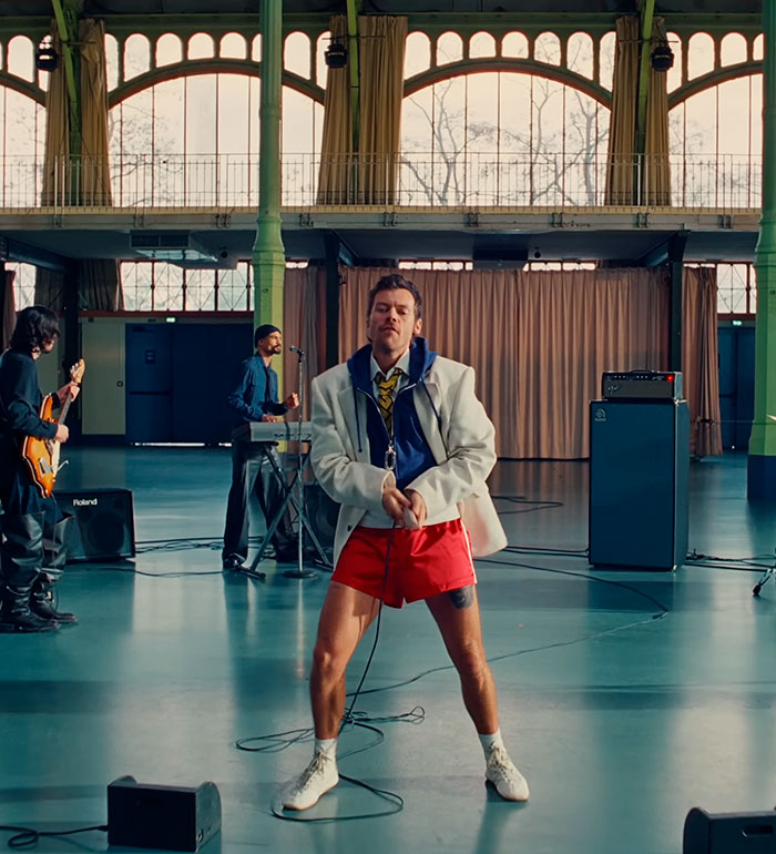 Harry Styles on stage during a performance, his red shorts visible, after a wardrobe malfunction exposed his package. Harry Styles on stage during a performance, his red shorts visible, after a wardrobe malfunction exposed his package.