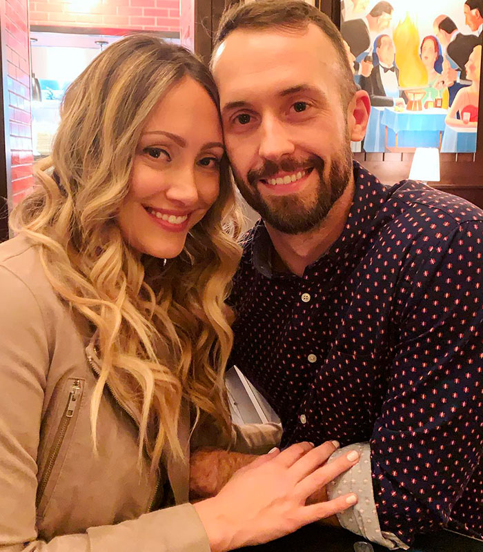 A couple smiling, illustrating the personal aspect of giving up her baby to a stranger. A couple smiling, illustrating the personal aspect of giving up her baby to a stranger.
