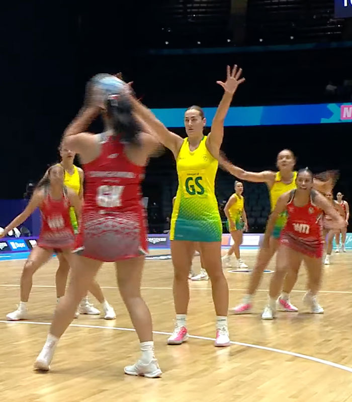 Female athletes in a sprint race, highlighting controversial wardrobe malfunction rules.