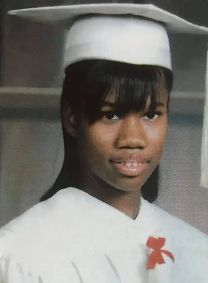 A rising track star, photographed in her graduation cap and gown, ready for her Olympic dreams. A rising track star, photographed in her graduation cap and gown, ready for her Olympic dreams.