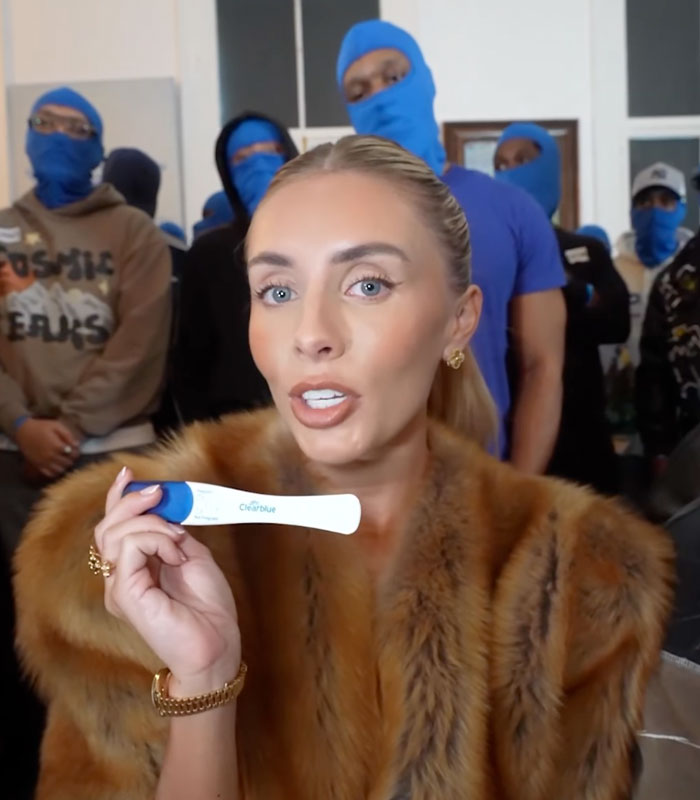 Bonnie Blue reveals pregnancy test results, surrounded by men at her baby shower scandal. Bonnie Blue reveals pregnancy test results, surrounded by men at her baby shower scandal.