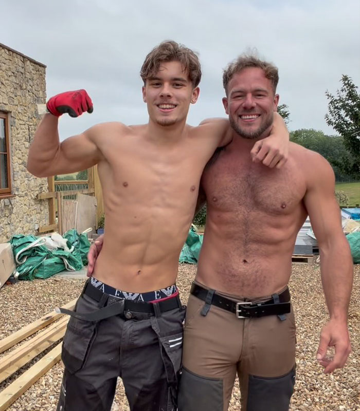 Controversial father-son adult content creators posing shirtless at a construction site. Controversial father-son adult content creators posing shirtless at a construction site.
