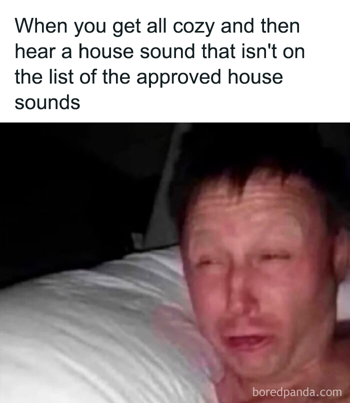 A relatable meme depicting a man with a disturbed expression in bed after hearing an unexpected house sound, boosting morale.