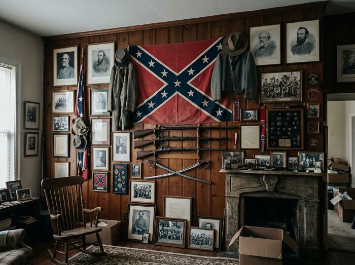 A room full of historical artifacts and confederate flags. A man might freak out encountering this in a woman's home.