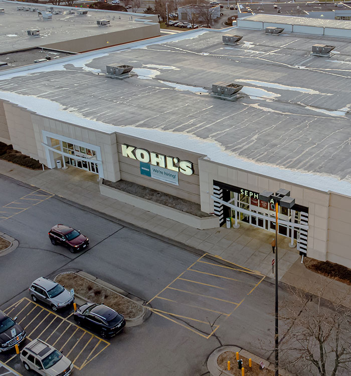 An aerial view of a Kohl's department store, where a dad is shopping for his daughters' clothes. An aerial view of a Kohl's department store, where a dad is shopping for his daughters' clothes.