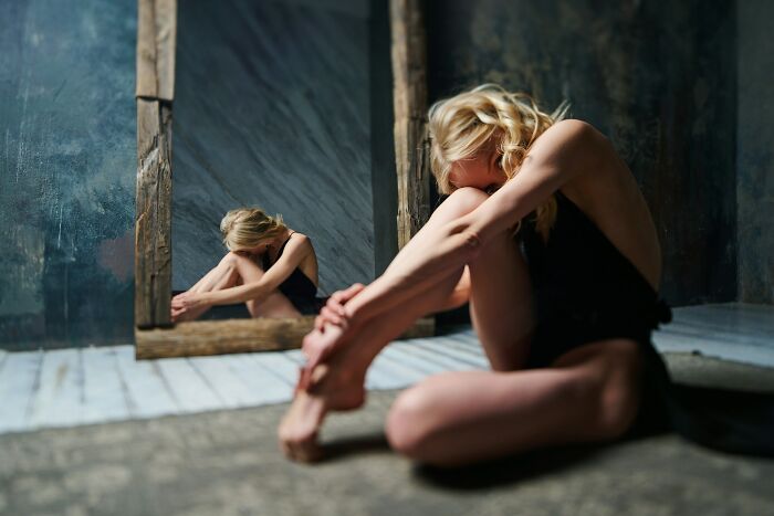 Woman in despair revealing her depressing secrets.