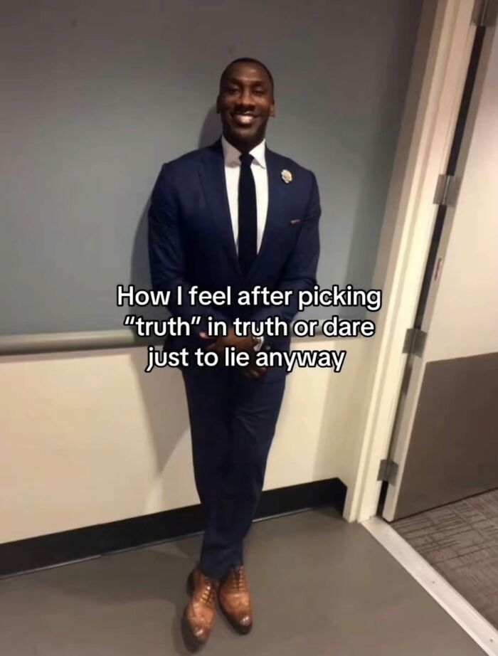 A man in a suit smiling, a relatable meme about lying after choosing truth in a game of truth or dare.