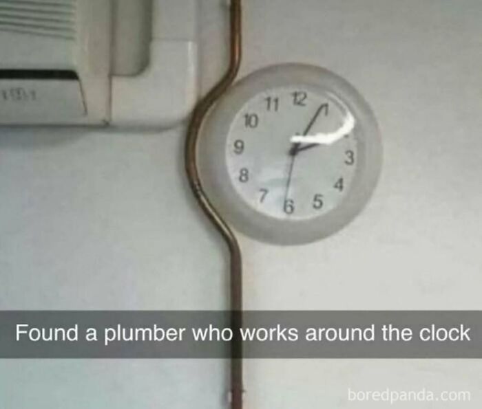 A clock with a pipe running through its center, humorously suggesting a plumber works around the clock, exemplifying cultural decline.