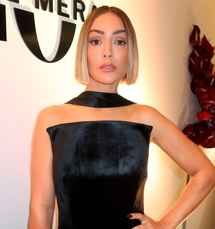 Close-up of a celeb in a black dress whose questionable renovations devalued her homes. Close-up of a celeb in a black dress whose questionable renovations devalued her homes.