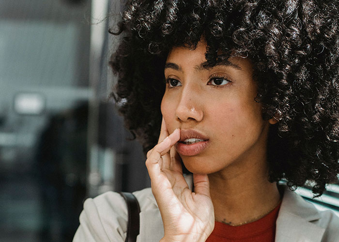 A thoughtful woman considers if she witnessed reality break.