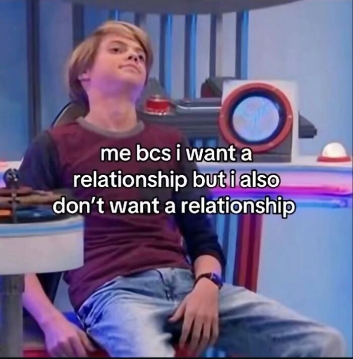 A relatable meme of a young man sitting, expressing the dilemma of wanting and not wanting a relationship.