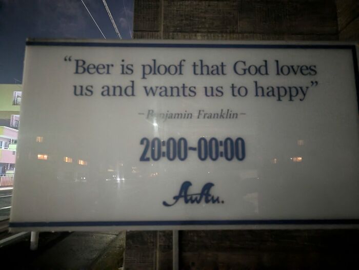 A sign in Japan with a quote: Beer is ploof that God loves us and wants us to happy, a hilarious example of lost in translation.