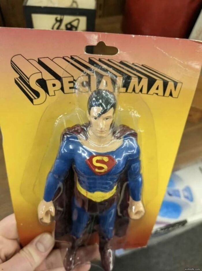A knockoff Superman action figure labeled SPECIAL MAN, illustrating a ridiculous post and cultural decline.