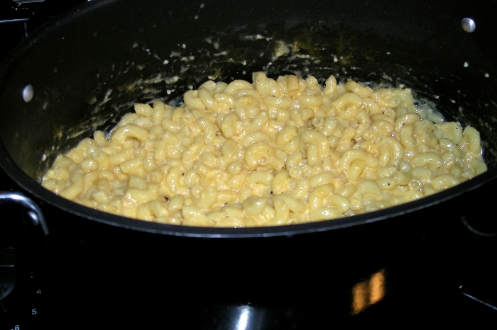 A pot filled with creamy macaroni and cheese for a birthday dinner, a potential disaster for a teen sister.