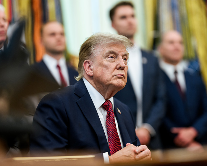 Donald Trump acknowledges a 16-year-old lifeguard for his heroic ocean rescue in a formal setting. Donald Trump acknowledges a 16-year-old lifeguard for his heroic ocean rescue in a formal setting.