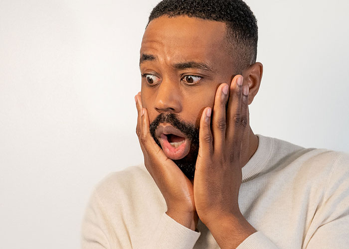 A man with a shocked expression. Many people swear they witnessed reality break for a second.